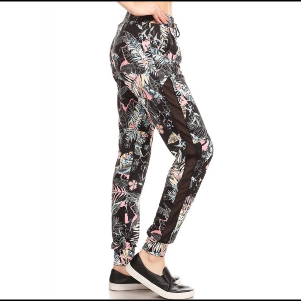Jogger trackpants with mesh overlay